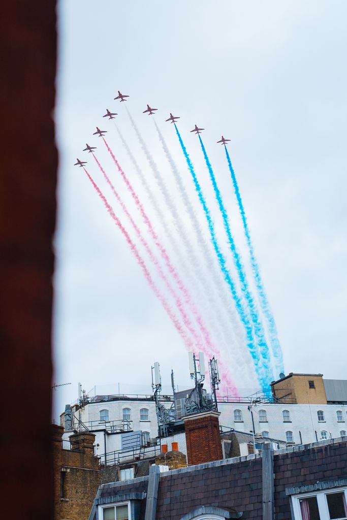 Nine jets perform the thrilling flypast streaming red, white and blue.