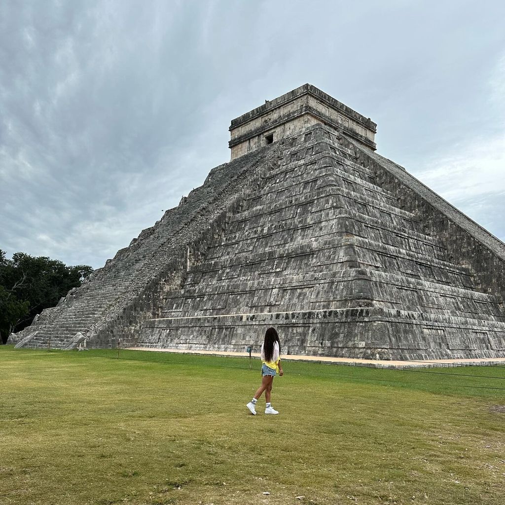 woman admiring pyramid in Mexico 
