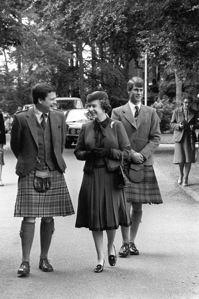 Prince Edward wearing a kilted at Gordonstoun school with Queen Elizabeth II