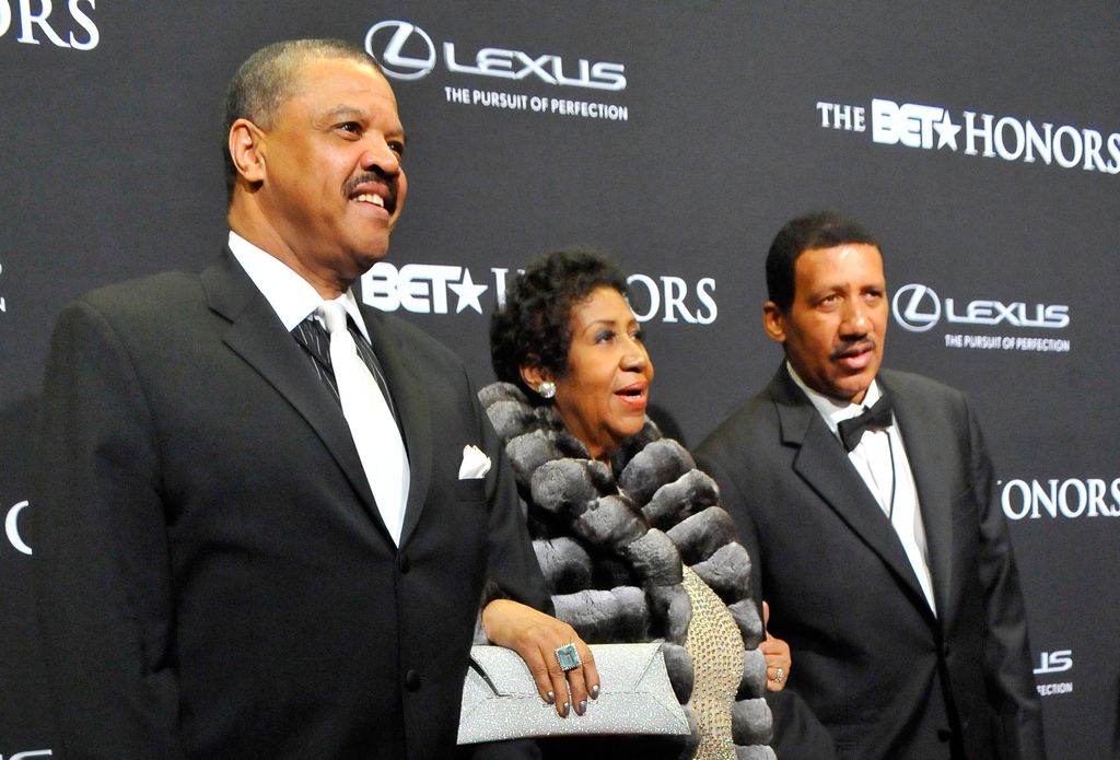 William Wilkerson, singer Aretha Franklin, and Edward Franklin attend BET Honors 2014 at Warner Theatre on February 8, 2014 in Washington, DC