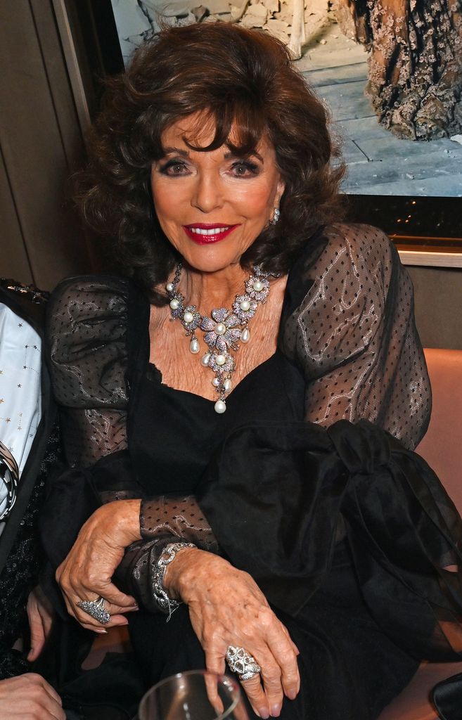 joan collins in black dress at Variety Club Showbusiness Awards 