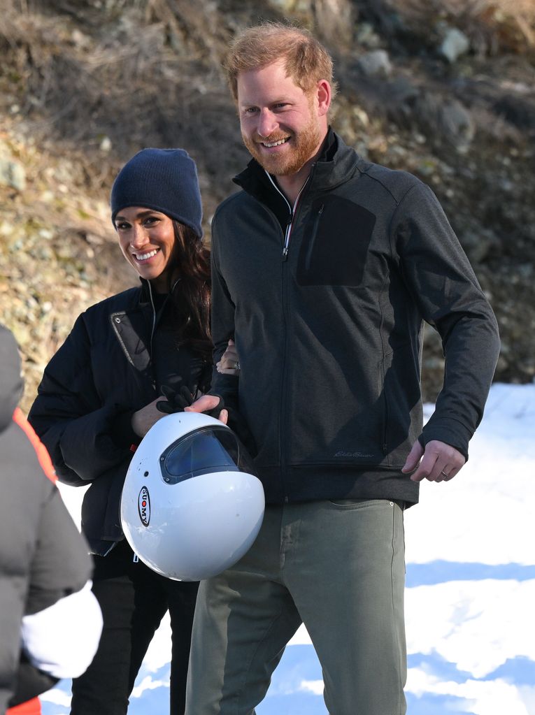 Harry and Meghan smiling at Whistler training camp