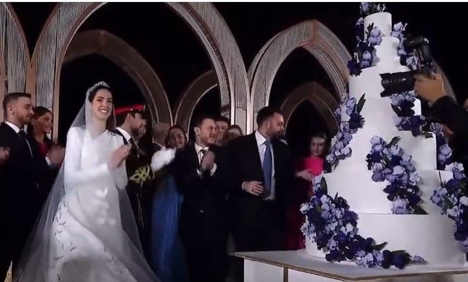 Princess Rajwa Al Saif of Jordan danced around the epic seven tier wedding cake