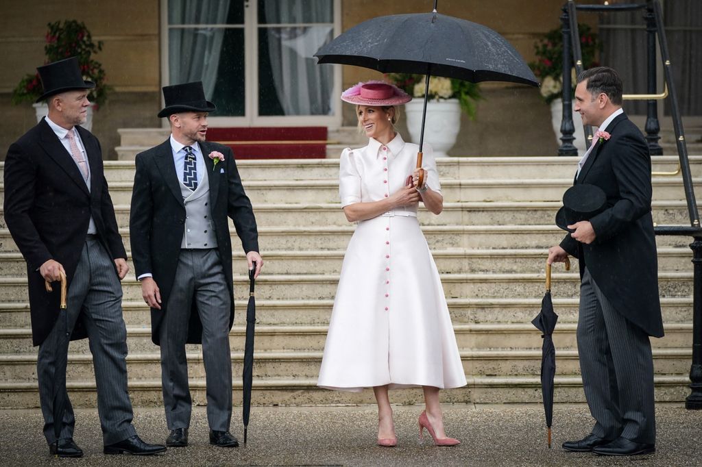 Zara Tindall channelling Mary Poppins under umbrella at Buckingham Palace Garden Party