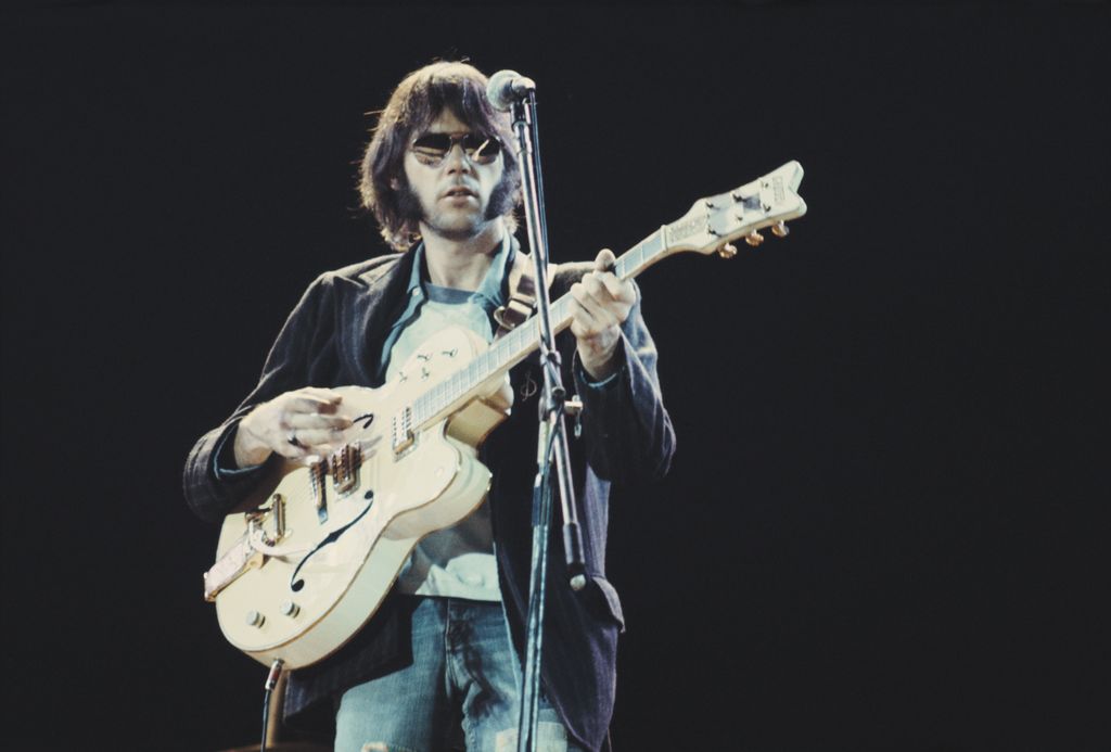 Canadian musician Neil Young of Crosby, Stills, Nash And Young performs on stage at Wembley Stadium, London on September 14th 1974
