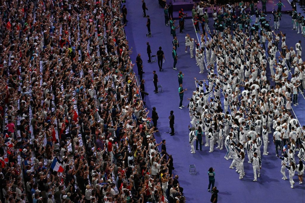 France athletes take part in the athletes parade during the closing ceremony of the Paris 2024 Olympic Games at the Stade de France, in Saint-Denis, in the outskirts of Paris, on August 11, 2024.