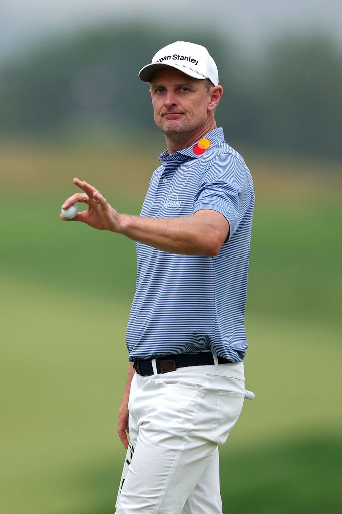Justin Rose of England waves to the crowd on the 18th hole green after finishing the second round of the 125th U.S. OPEN at Oakmont Country Club on June 13, 2025 in Oakmont, Pennsylvania.