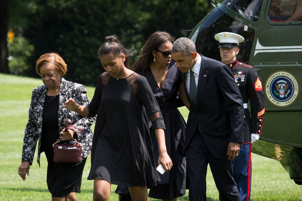 Marian Robinson, Sasha Obama, First Lady Michelle Obama and U.S. President Barack Obama exit Marine One in 2015