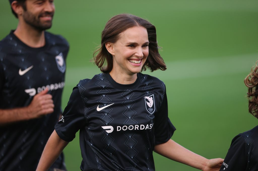 Angel City FC Founder Natalie Portman runs off the field before a game between San Diego Wave FC and Angel City FC at Titan Stadium on March 19, 2022 in Fullerton, California
