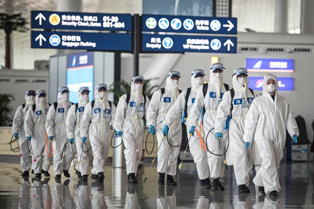 Firefighters prepare to conduct disinfection at the Wuhan Tianhe International Airport on April 3, 2020 in Wuhan, Hubei Province, China. Wuhan, the Chinese city hardest hit by the novel coronavirus outbreak, conducted a disinfection on the local airport a
