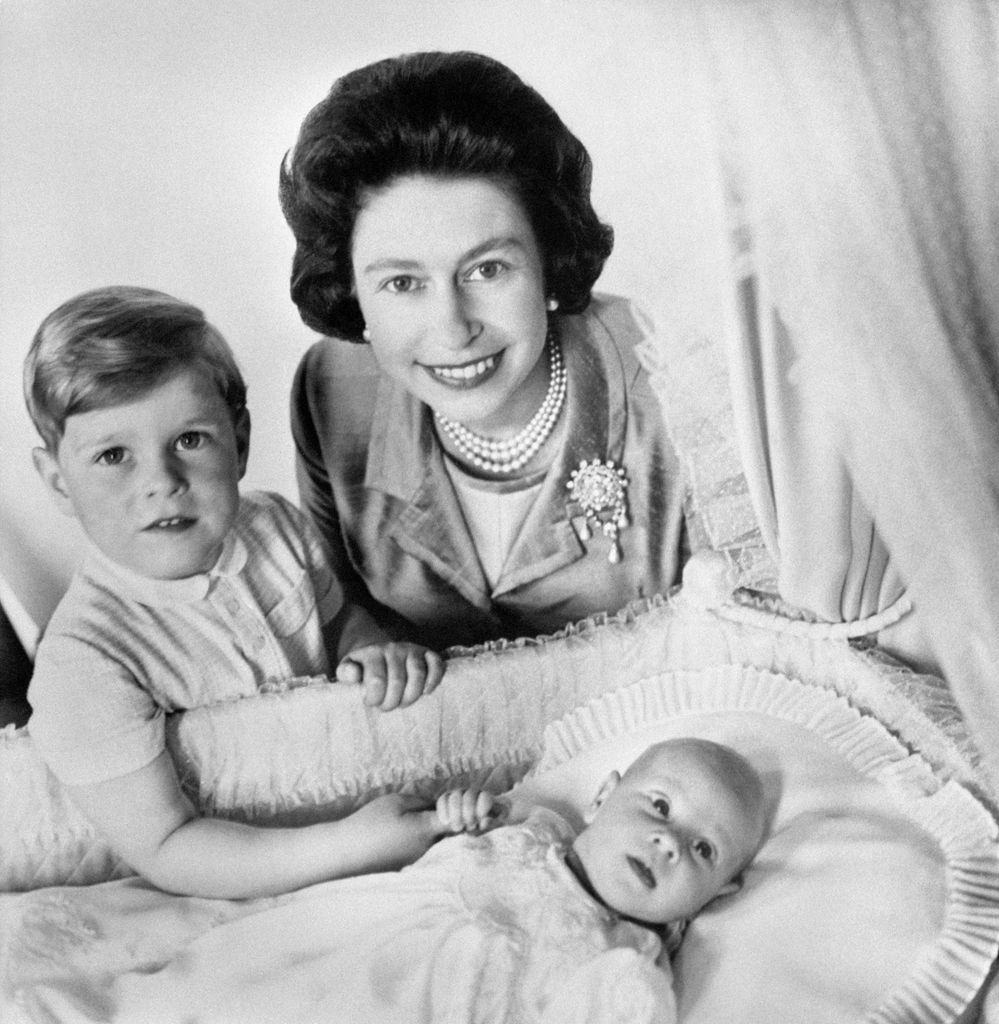 Baby Prince Edward with Prince Andrew and the Queen in 1964