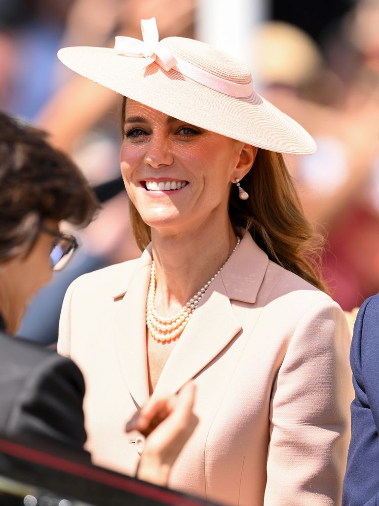 Catherine, Princess of Wales shoulders up in blush jacket and hat