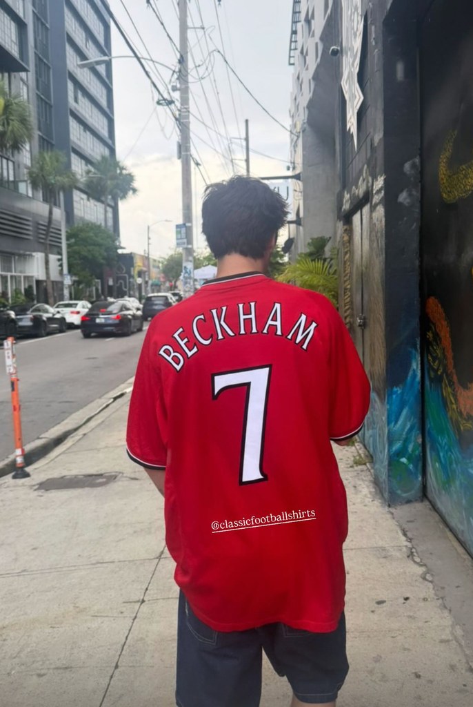 Cruz Beckham paying homage to his father with a Man-U shirt