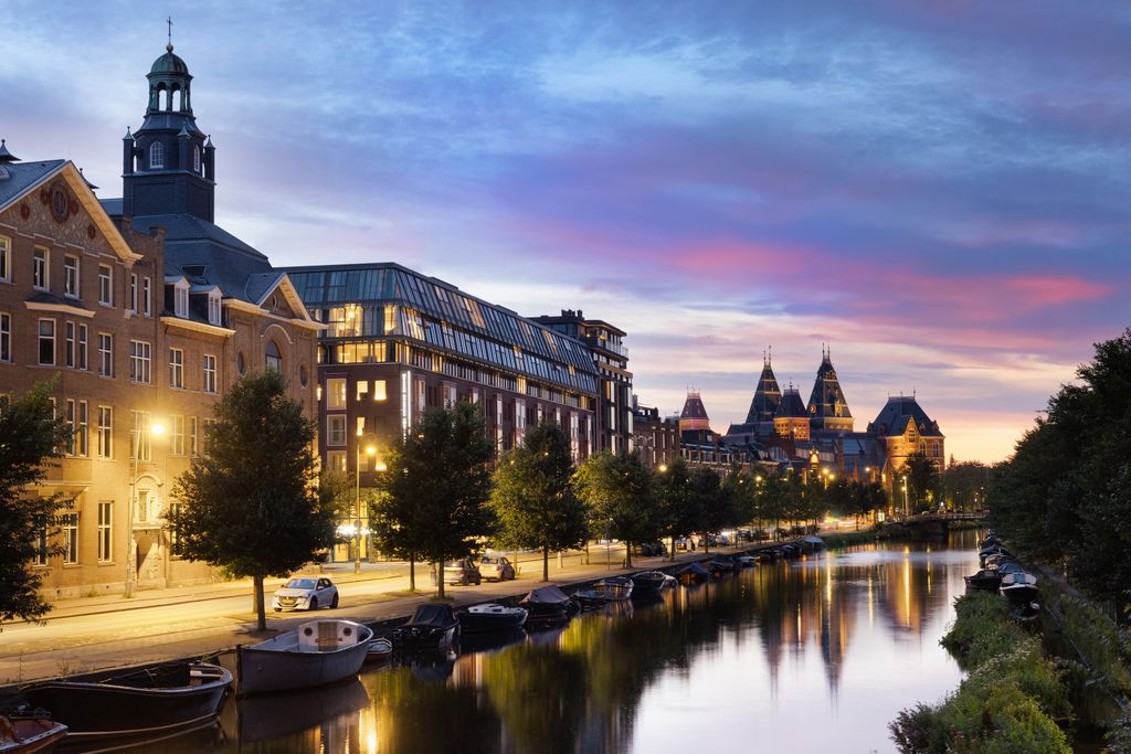Amsterdam’s canals with blue skies