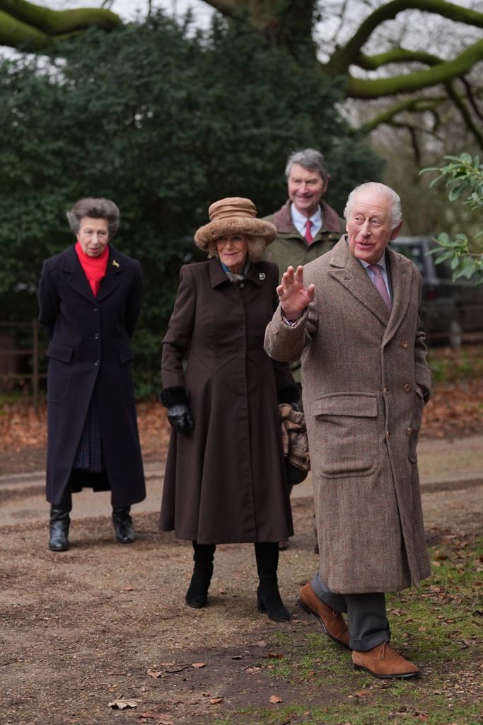 king Charles III, Queen Camilla, the Princess Royal and her husband Vice Admiral Sir Tim Laurence, outside in coats