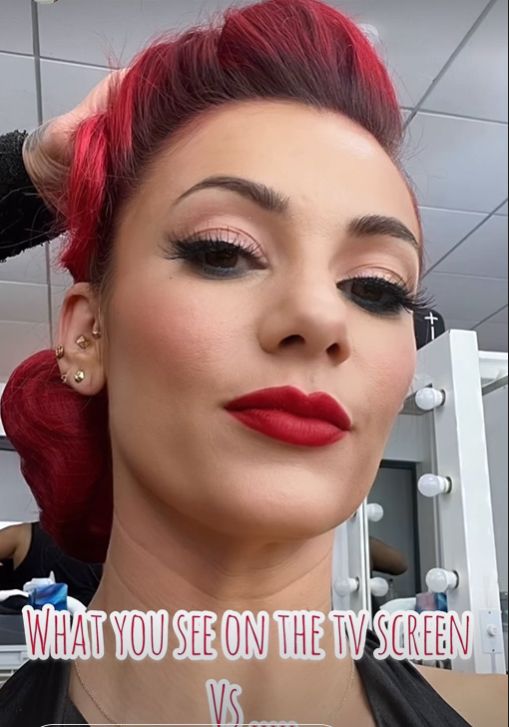 Dianne Buswell in a makeup chair with red hair