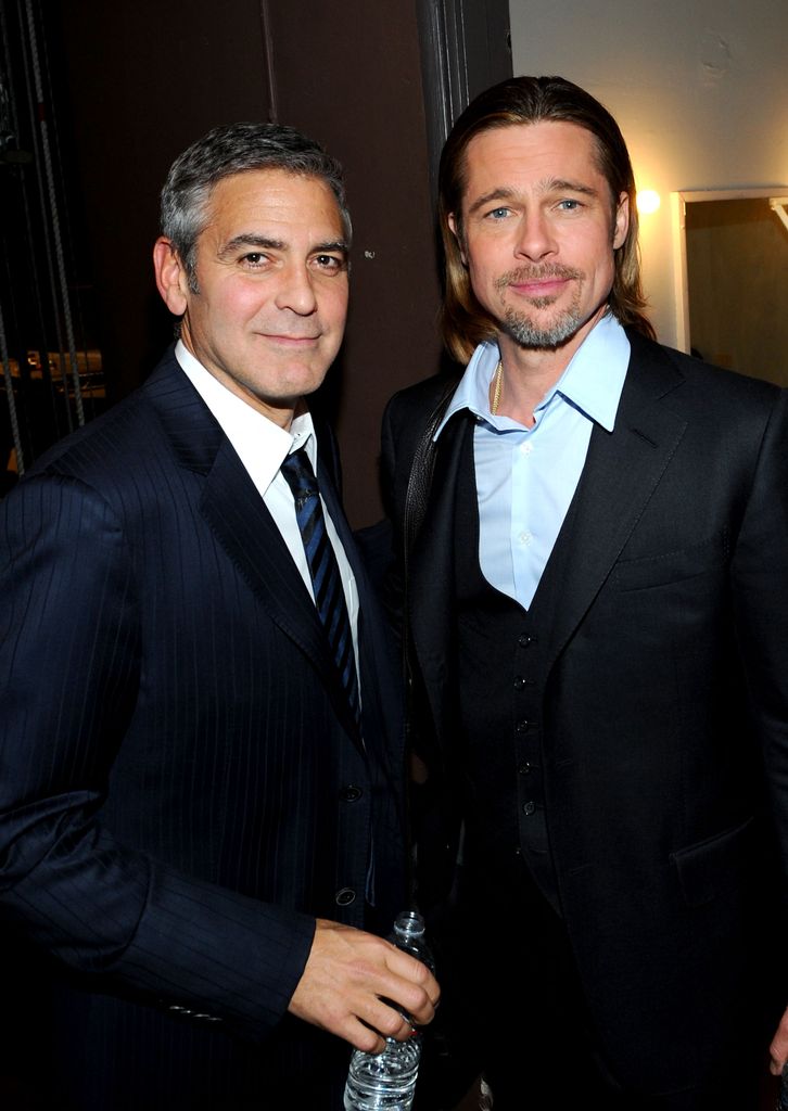 Actors Brad Pitt (L) and George Clooney attend the one-night reading of "8" presented by The American Foundation For Equal Rights & Broadway Impact at The Wilshire Ebell Theatre on March 3, 2012 in Los Angeles, California
