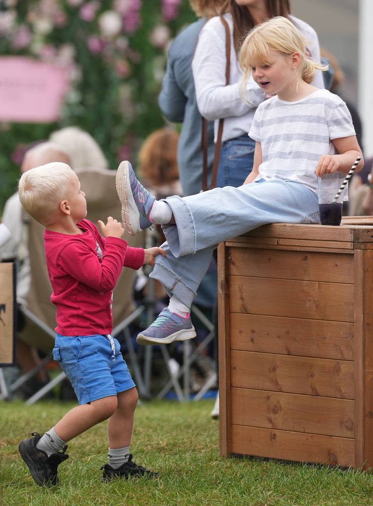 Lucas Tindall is a 'wild' child on day out with dad Mike Tindall to ...