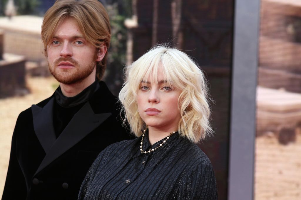 Finneas O'Connell and Billie Eilish attend the "No Time To Die" World Premiere at Royal Albert Hall on September 28, 2021 in London, England. 