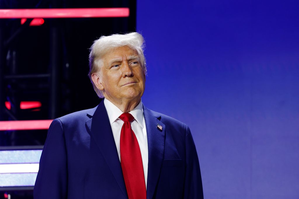 Donald Trump arrives to a Q&A with Pastor Paula White at the National Faith Advisory Summit on October 28, 2024 in Powder Springs, Georgia. 