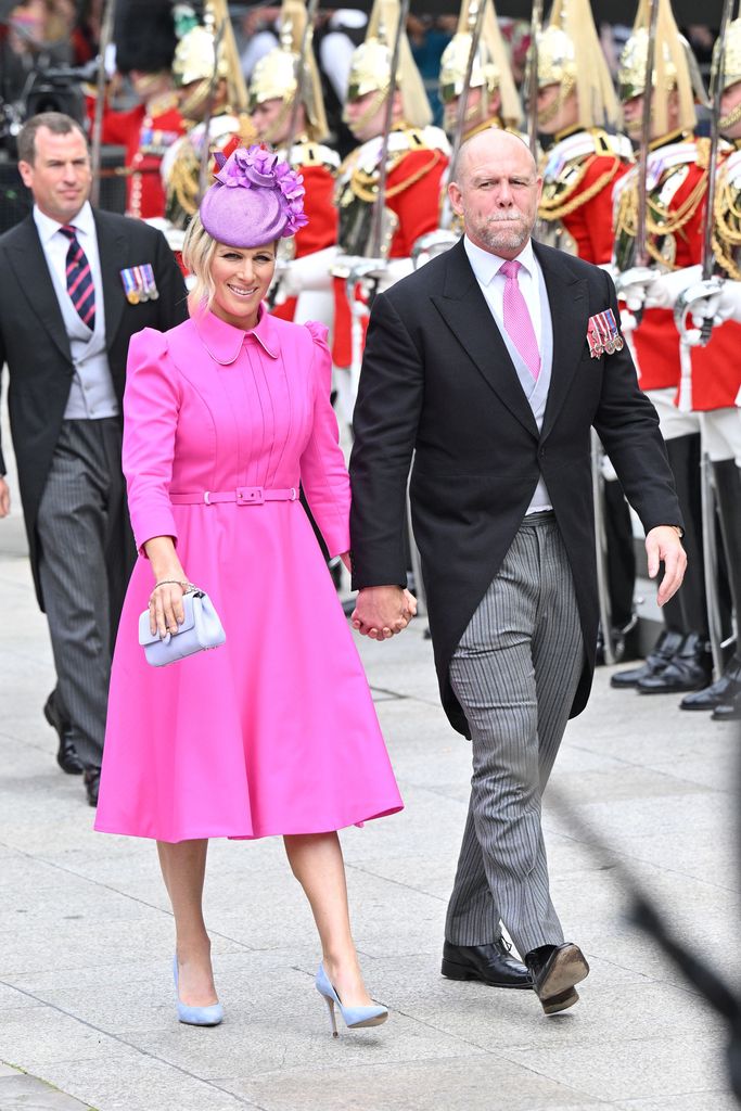 Zara Tindall wears a barbie pink dress with husband Mike Tindall attend the National Service of Thanksgiving at St Pauls Cathedral on June 03, 2022 in London, England