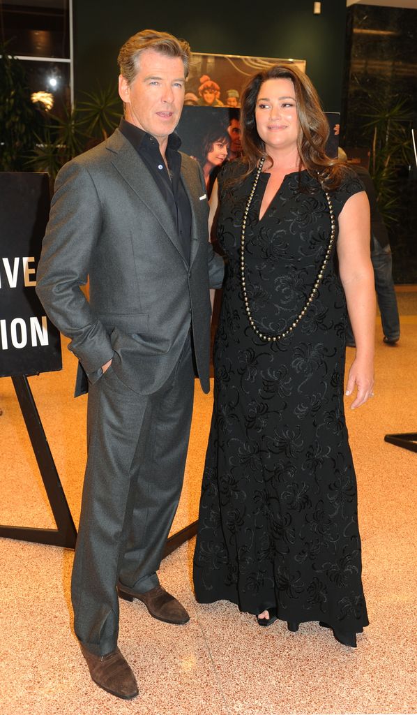 Pierce Brosnan and his wife Keely Shaye Smith on the red carpet as they arrive for the premiere of "The Greatest" at the Linwood Dunn theater 