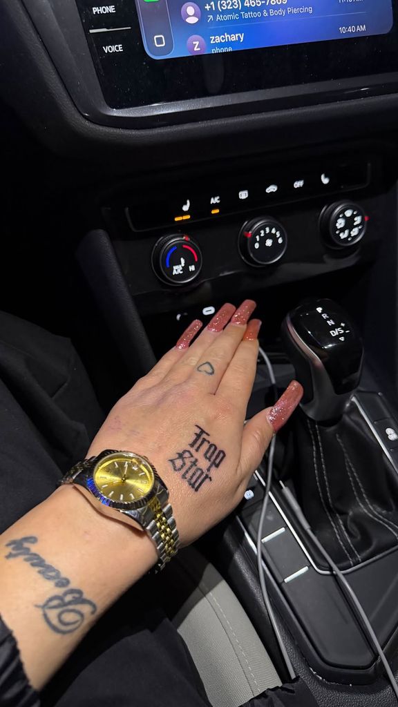 amanda bynes trap star tattoo