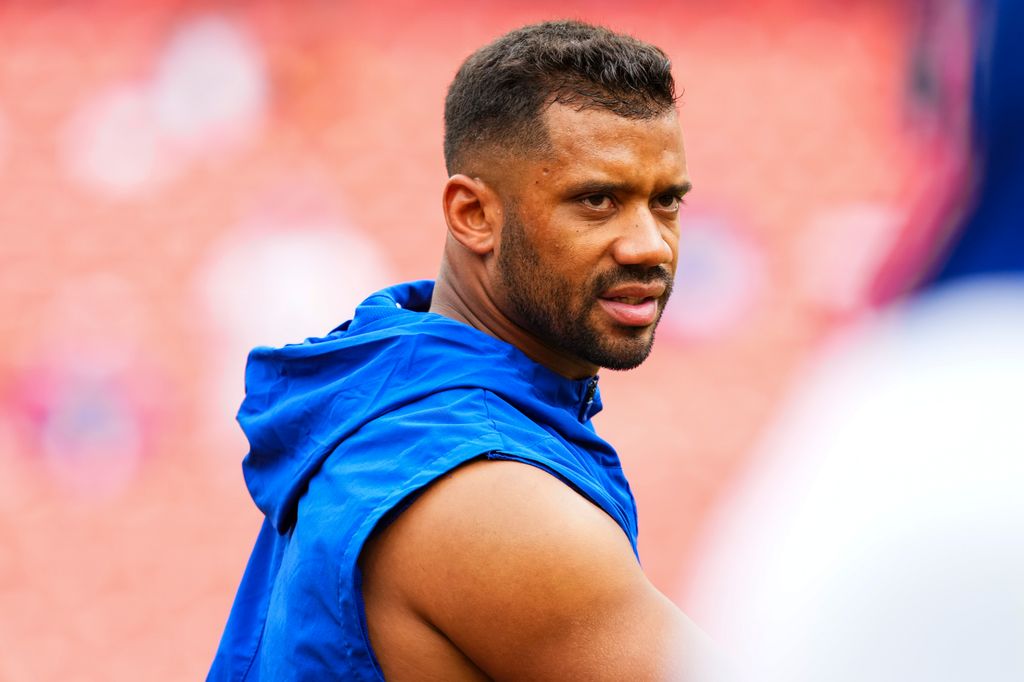 photo of russell wilson in giants top