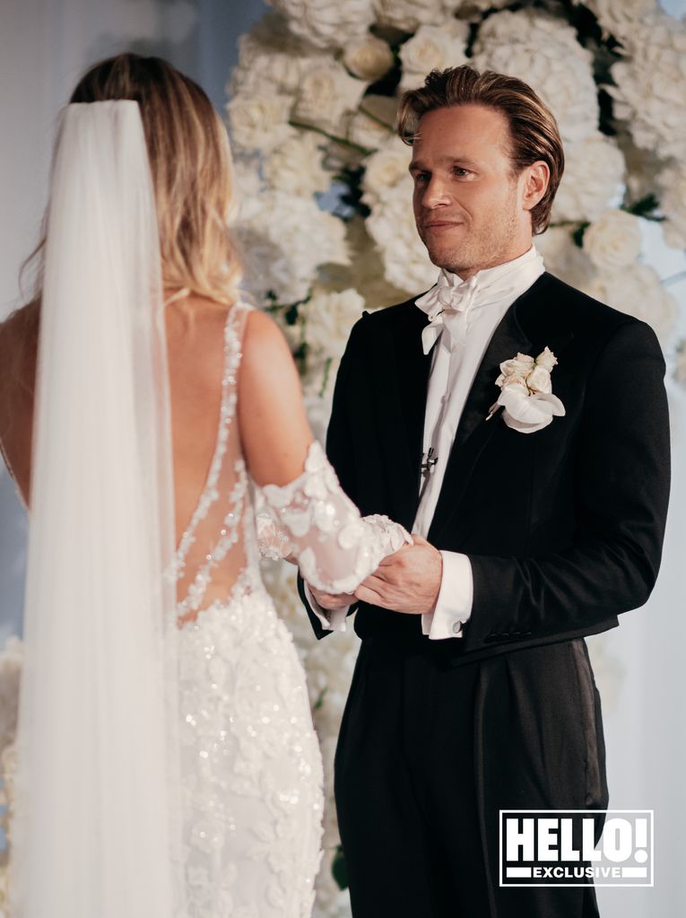 Olly Murs admires his beautiful bride Amelia