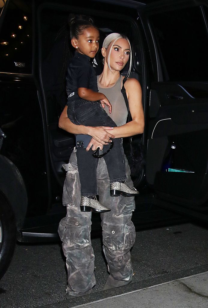 Kim Kardashian carrying Chicago