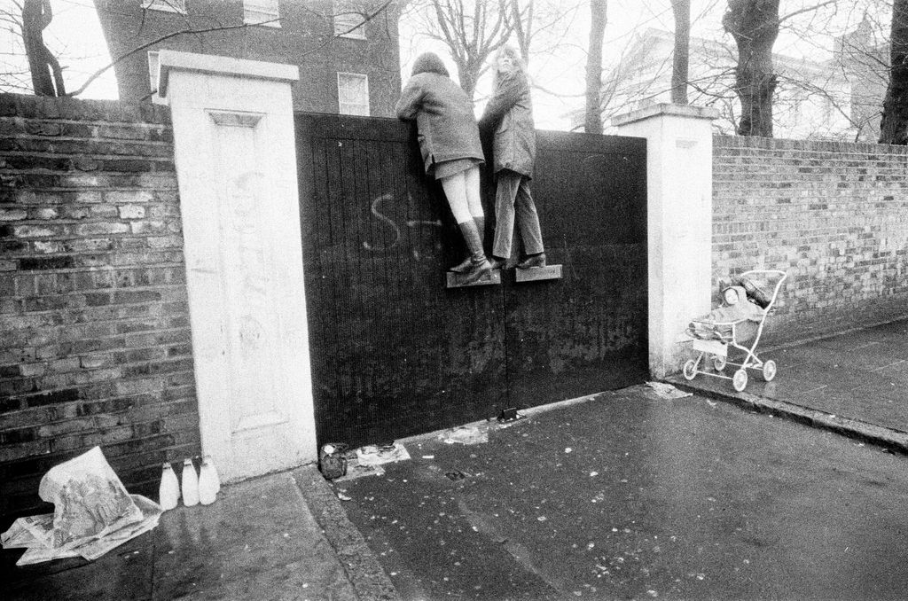 Fans climb up Paul McCartney's front gates of his St John's Wood, Cavendish Avenue homeon the day of his civil Wedding to Linda Eastman Picture taken - 12th March 1969. (Photo by Daily Herald/Daily Herald/Mirrorpix via Getty Images)