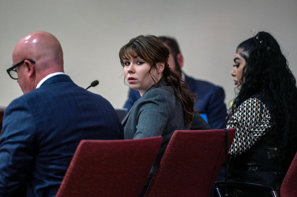 Hannah Gutierrez-Reed, center, sits with her attorney Jason Bowles, left, during the first day of testimony in the trial against her at First Judicial District Courthouse on February 22, 2024 in Santa Fe, New Mexico. Gutierrez-Reed, who was working as the armorer on the movie "Rust" when a revolver actor Alec Baldwin was holding fired killing cinematographer Halyna Hutchins and wounded the film's director Joel Souza, is charged with involuntary manslaughter and tampering with evidence. (Photo by Eddie Moore-Pool/Getty Images)