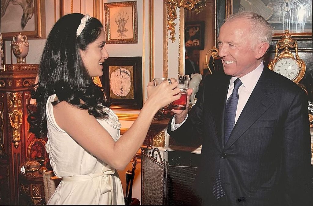 Salma Hayek and her father-in-law François Pinault caught mid celebration in a throwback photo