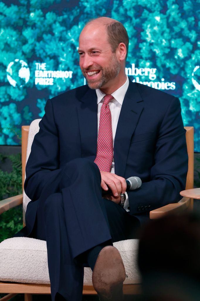 Prince William in suit on stage