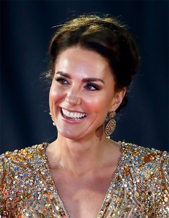kate middleton wears gold Jenny Packham dress to Bond premier
