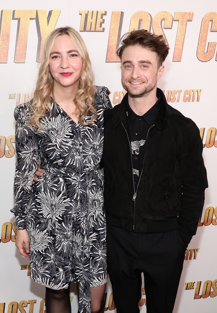 Erin Darke and Daniel Radcliffe attend a screening of "The Lost City" at the Whitby Hotel on March 14, 2022 in New York City