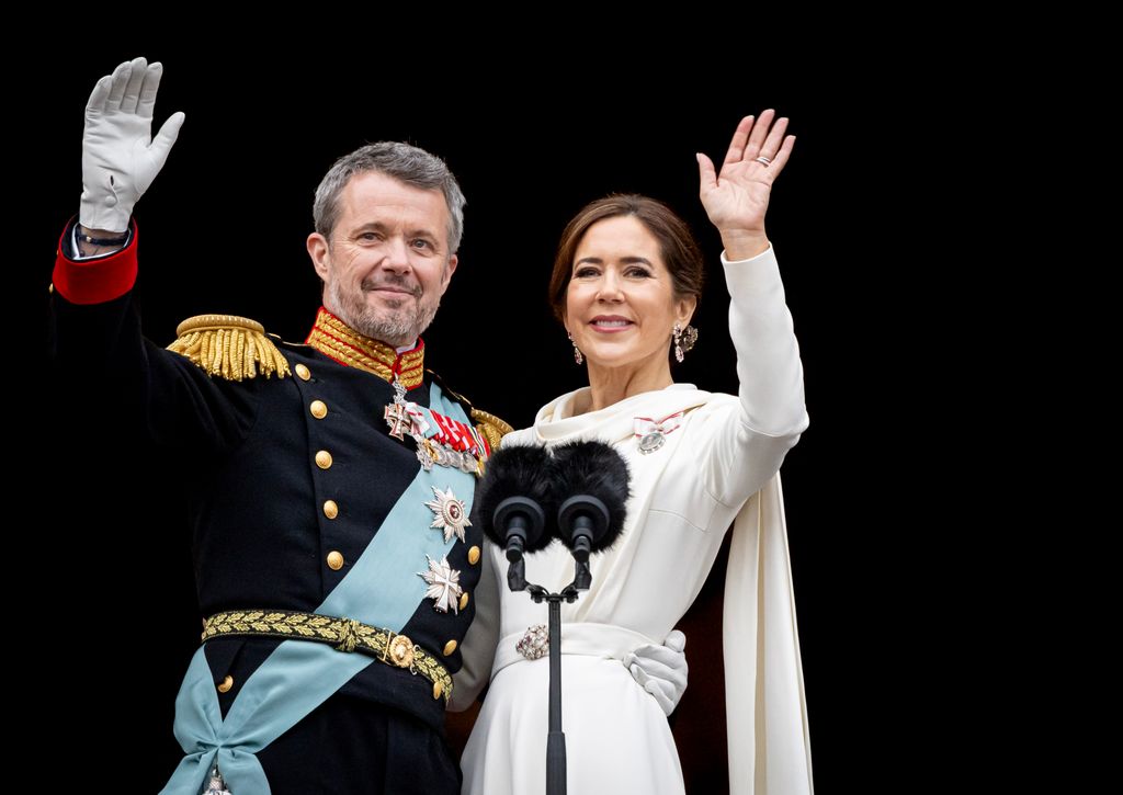 King Frederik X of Denmark and Queen Mary of Denmark appear on the balcony of Christiansborg Palace after a declaration of the King's accession to the throne