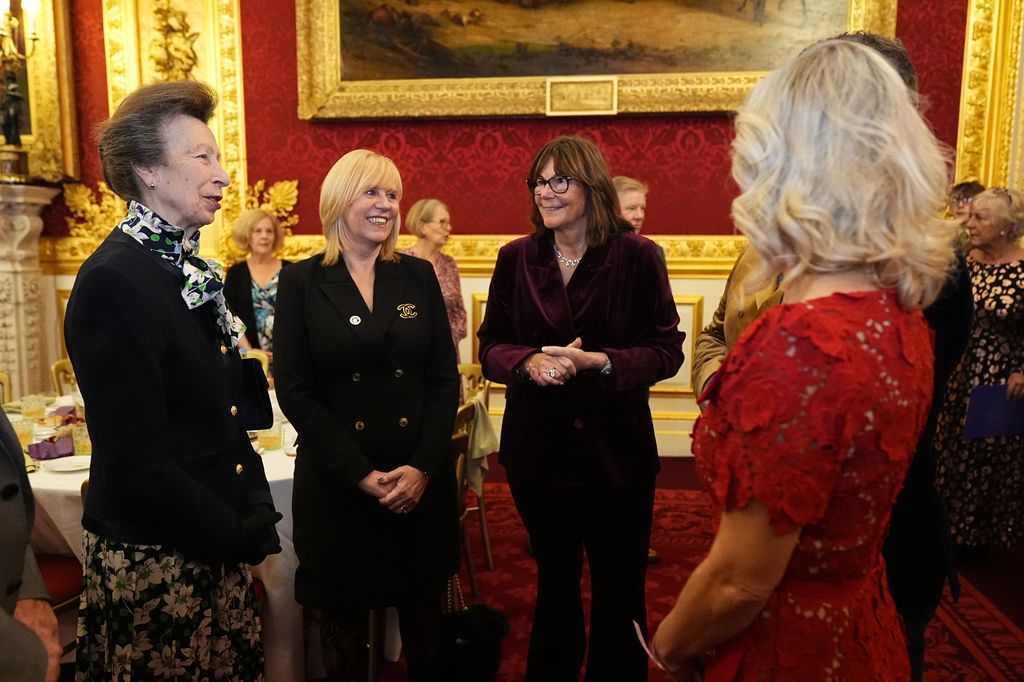 Anne wore a floral shirt dress and a blazer