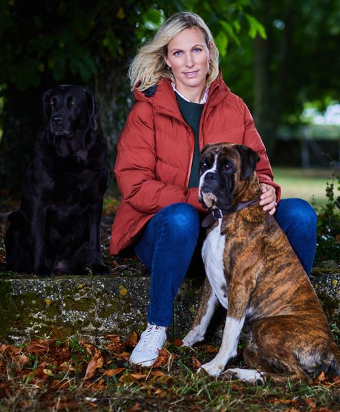zara tindall modelling shot with dogs