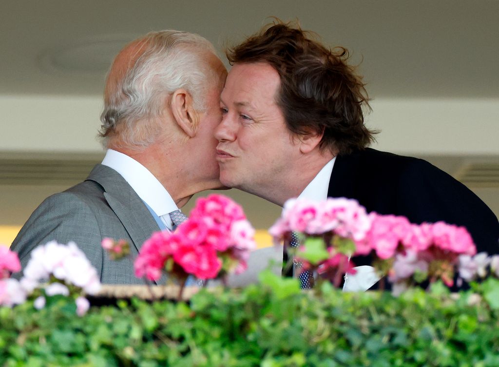 Tom Parker Bowles kissing Charles at Royal Ascot