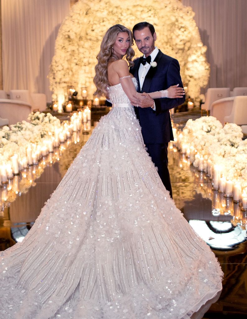 Richard Gonzalez and his bride, Sarah Rollins, on their wedding day
