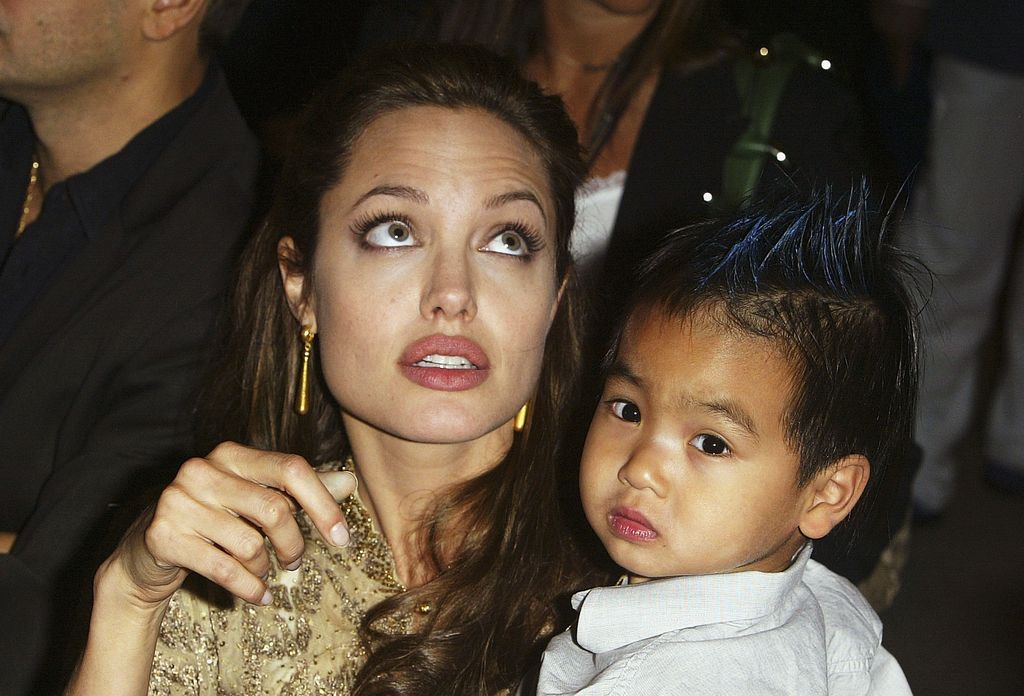 Angelina Jolie and her son Maddox attend the World Premiere of "Shark Tale" in San Marco Square, as part of the 61st Venice Film Festival on September 10, 2004 in Venice, Italy.

