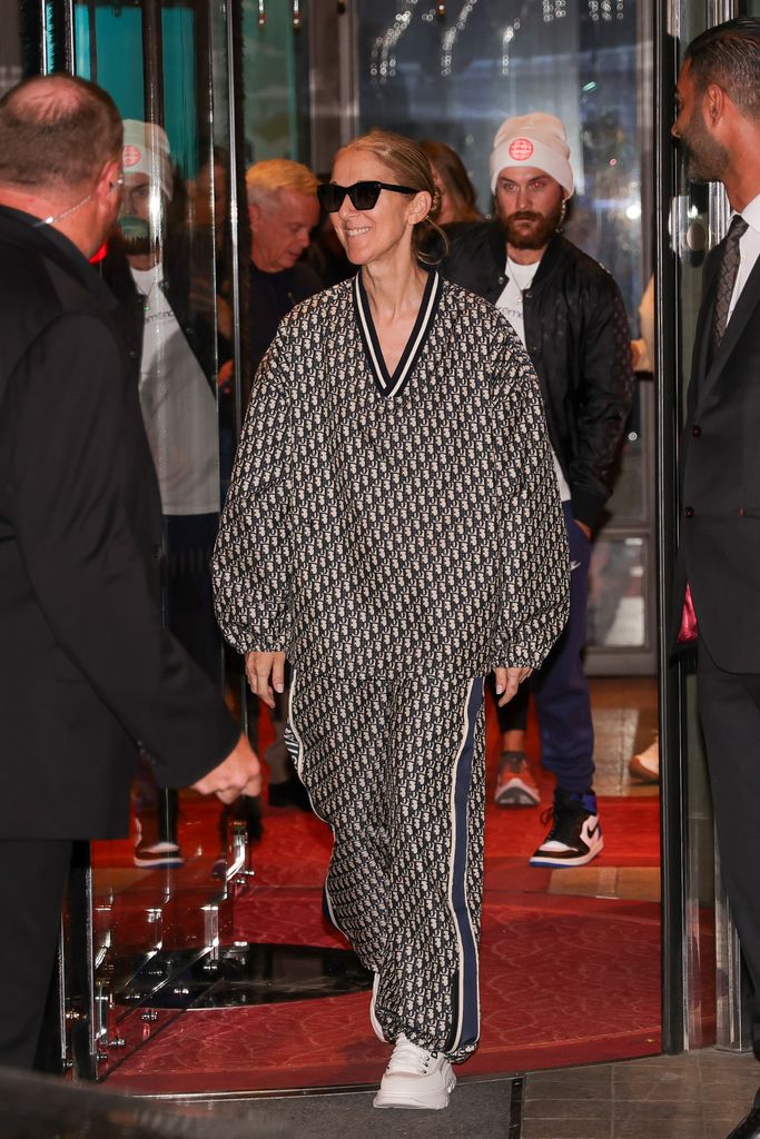 Celine Dion wearing top to toe logos in Paris