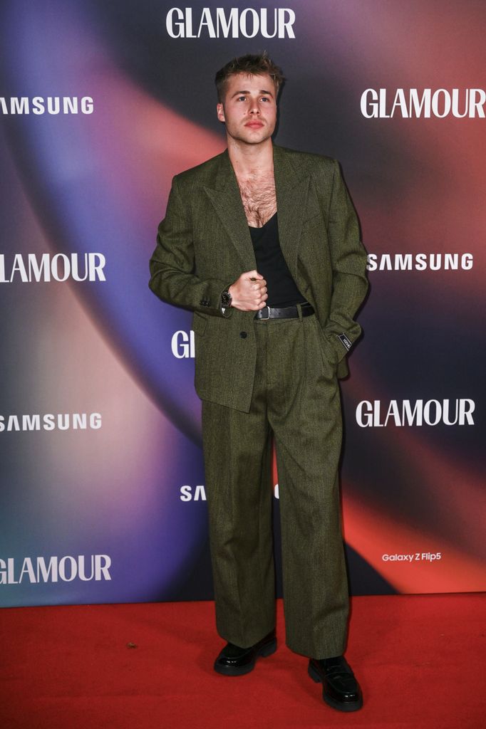 The Crown star Ed McVey chanelled effortless tailoring in an olive-hued suit