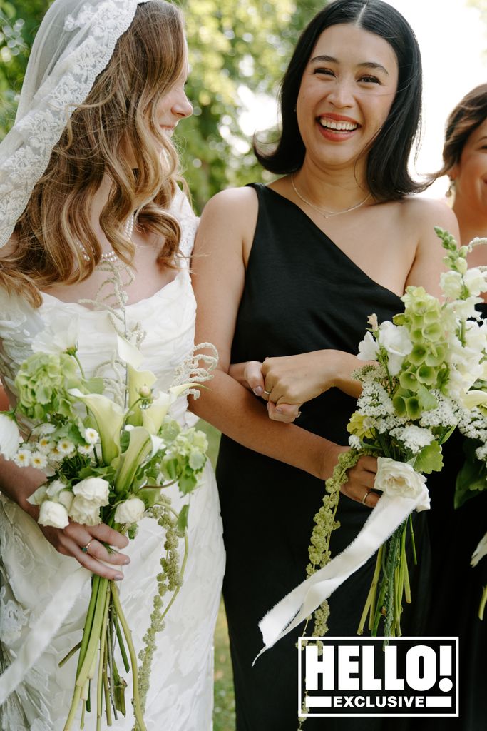 Tessa Mossey stands with her bridal party 
