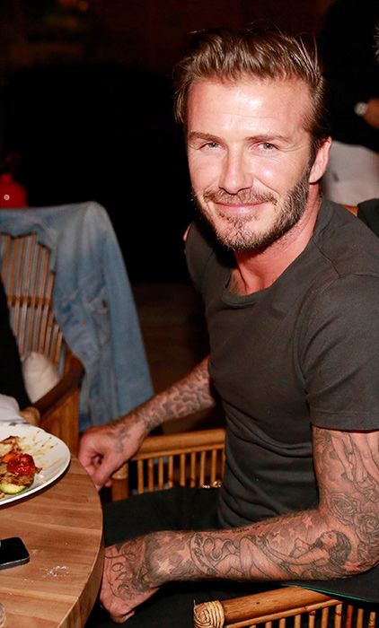 David Beckham mixes business with pleasure at dinner meeting with Simon ...
