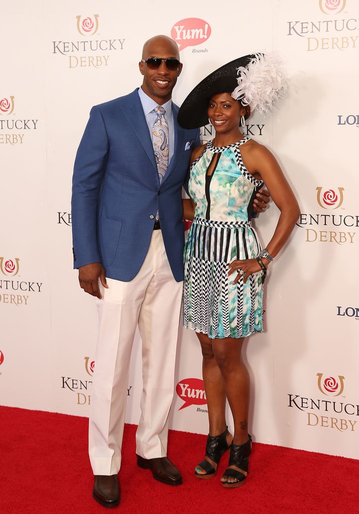 Detroit Pistons guard Chauncey Billups, with his wife, Piper, arrives on the red carpet before the 140th running of the Kentucky Derby at Churchill Downs in Louisville, Ky.