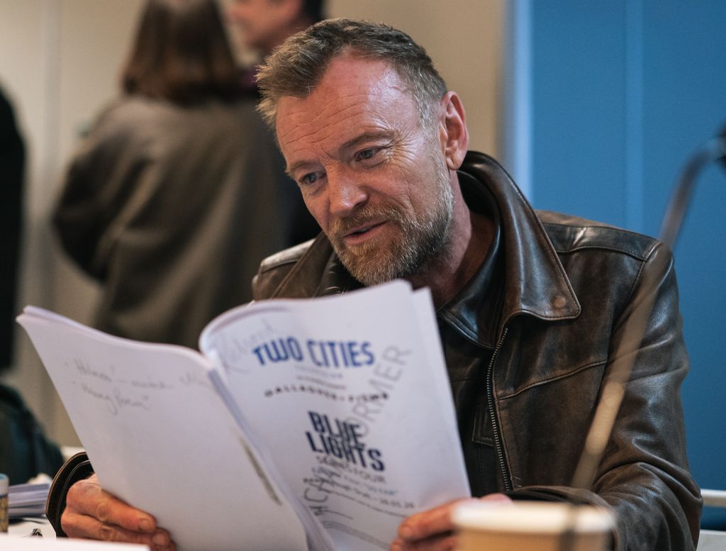 Richard Dormer reading a script for Blue Lights
