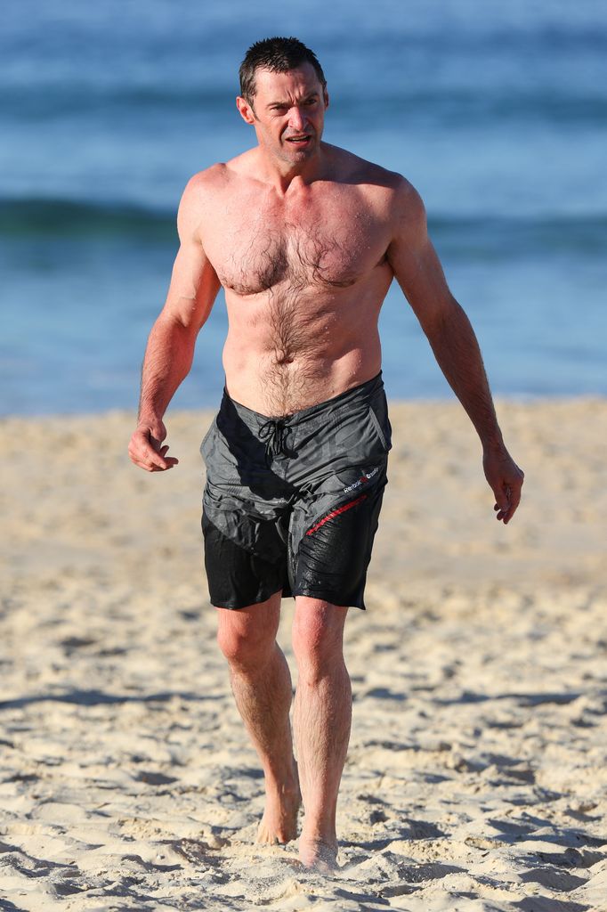 Hugh Jackman swims at Bondi Beach 