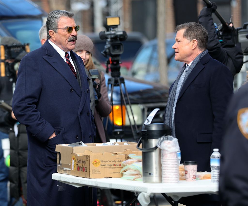 Tom Selleck and Dylan Walsh are seen on the set of "Blue Bloods" on February 24, 2023 in New York City.